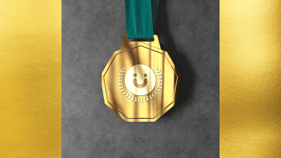 gold medal on grey background thumbnail