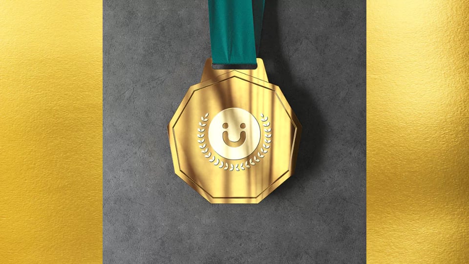 gold medal on grey background thumbnail