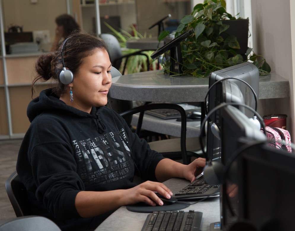 women working on computer image