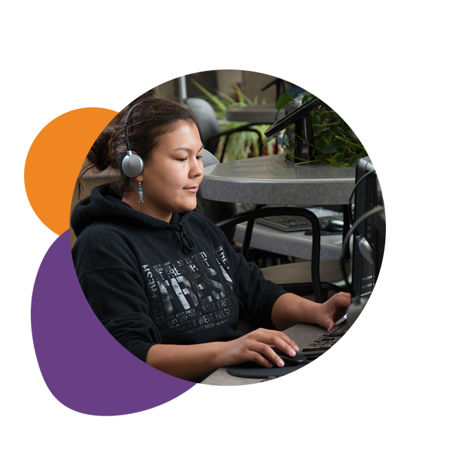 women working on computer with Andgo brand elements graphic
