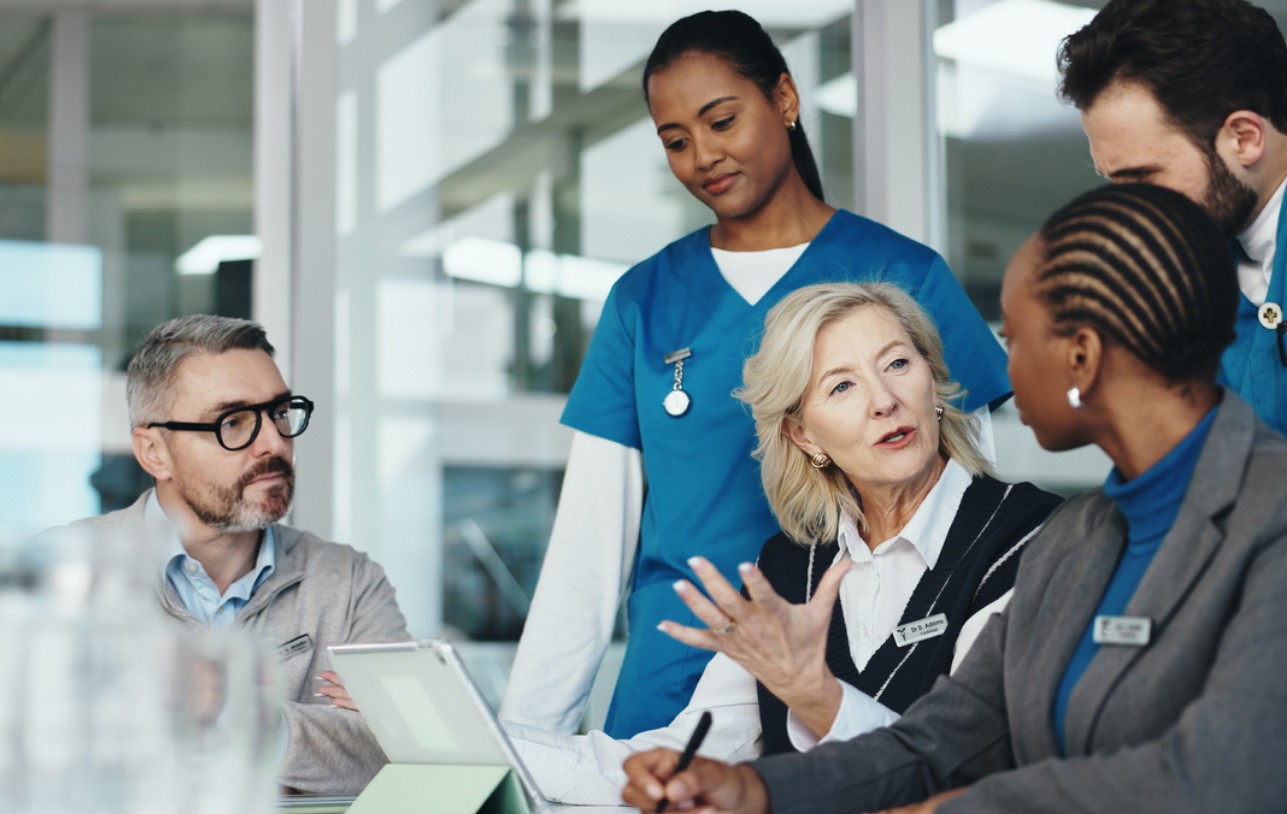 Nursing staff discussing standardization policies. 