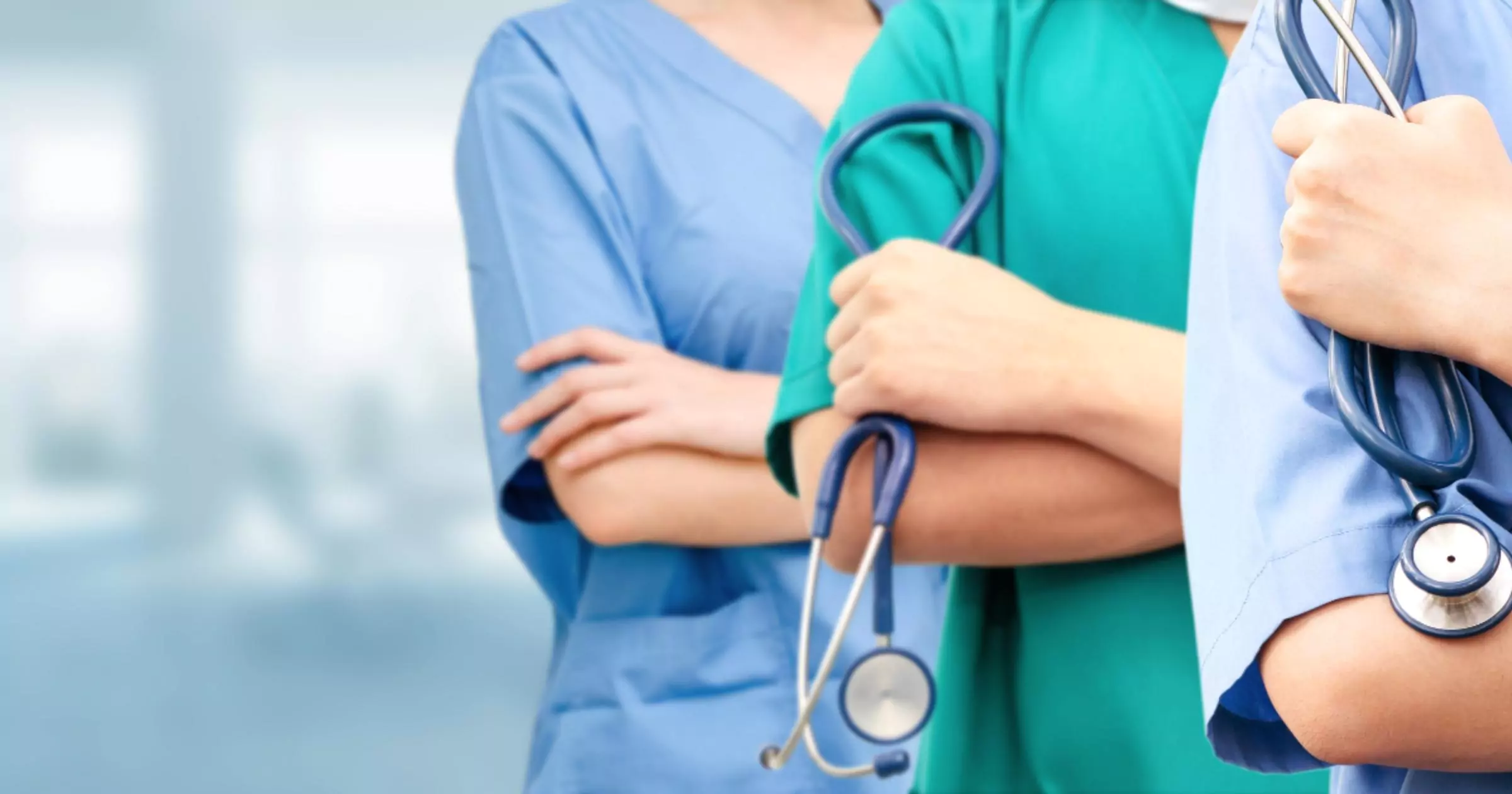 hospital staff holding stethoscope