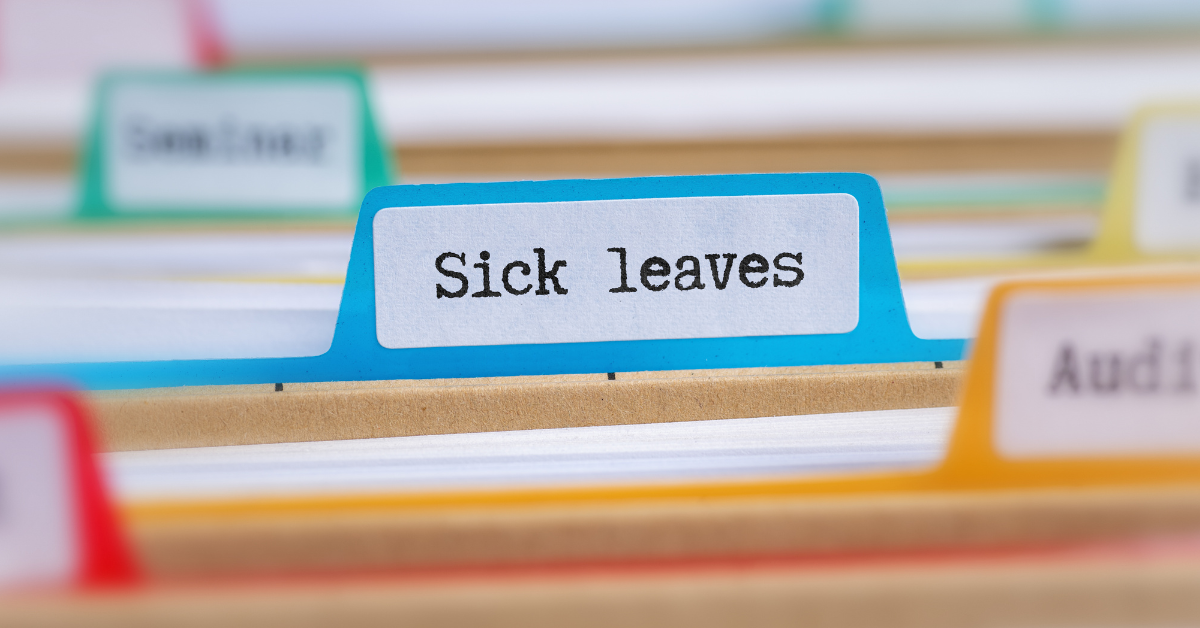 file folders with a tab labeled sick leaves image