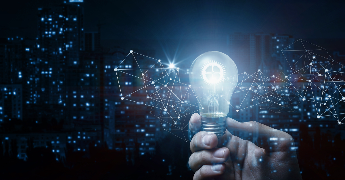 hand holding a bulb illustrating concept of idea and innovation image