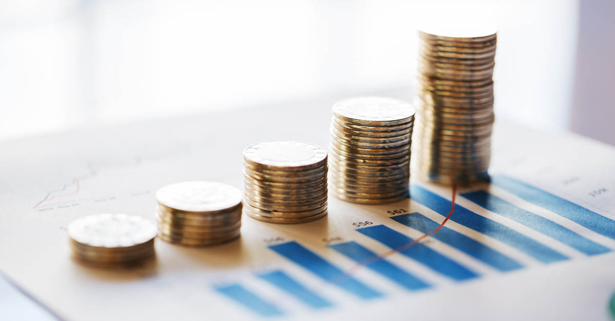 stack of coins in a row on business financial report image