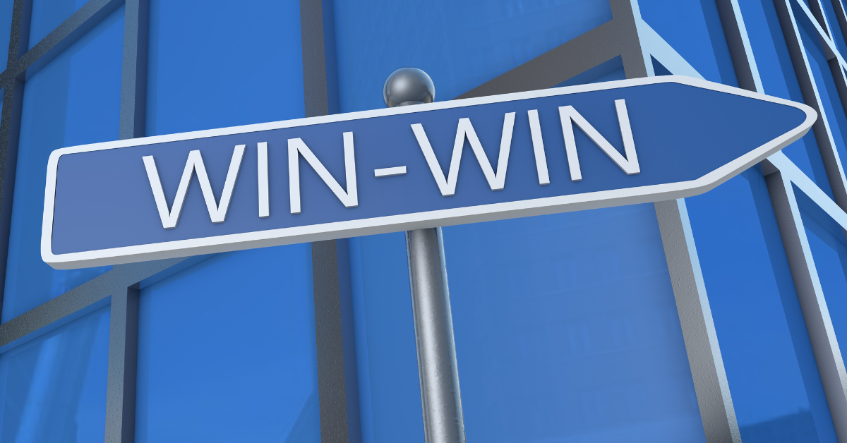 win win text on a street sign in front of a building image