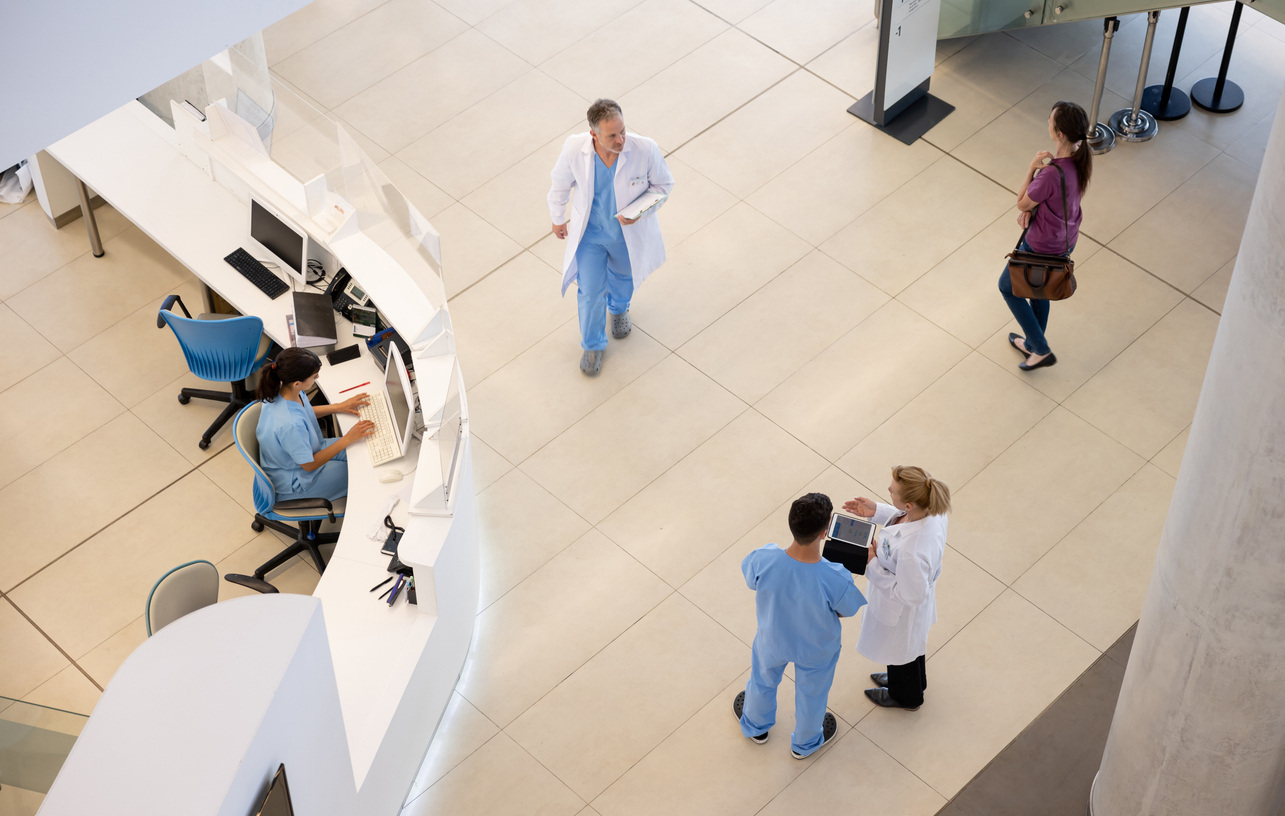 Nurses walking around a hospital floor